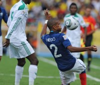 France's player Loic Nego (R) vies for t
